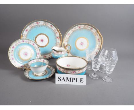 A Noritake part teaset with floral and gilt decoration on a blue ground, three Stuart Crystal wines (one chipped), and a quan