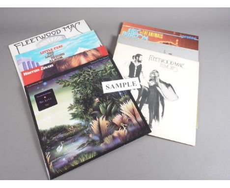 A collection of LP records, including Fleetwood Mac "Rumours" and "Tango in the Night", The Police "Outlandos D'Amour", Steel