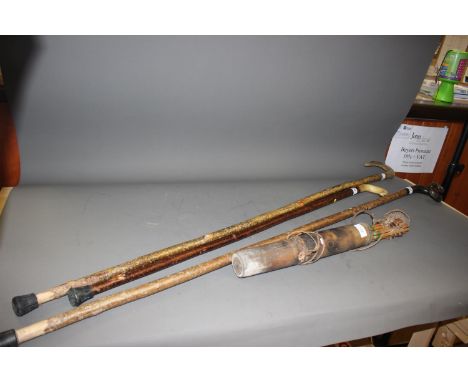 Two shepherds horn and hazel crooks, and a similar walking stick