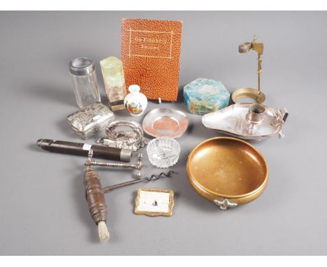 A quartz crystal with white metal band, a white metal chamber stick, a white metal Oriental box, a wooden handled corkscrew a