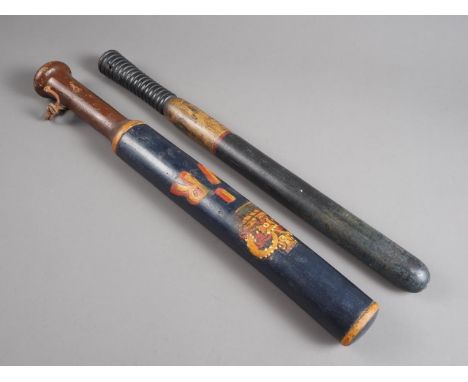 A Victorian truncheon/tipstaff with painted decoration, "VR RBRC 194", 18 1/2" long, and another similar 18 1/4" long