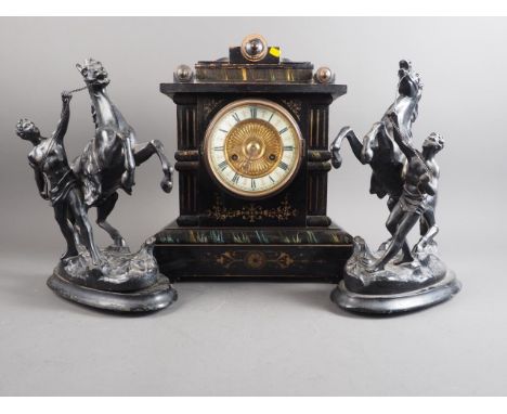 A pair of black painted spelter Marley Horse models, 11" high, and an ebonised wood mantel clock with painted decoration, whi