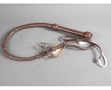 A brown leather&nbsp; bull whip 