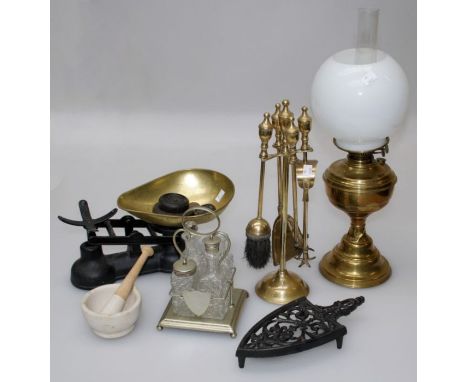 A mixed lot of collectors items including brass paraffin lamp, cast iron scales and weights, pestle and mortar, companion sta