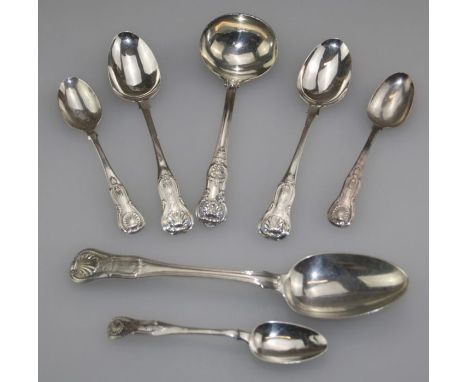 George W Adams, a pair of Victorian silver fiddle, thread and shell pattern dessert spoons, London 1851, together with a matc