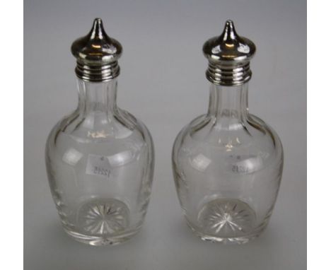 A matched pair of silver mounted oil/vinegar bottles, Birmingham 1926/1927, 13cm