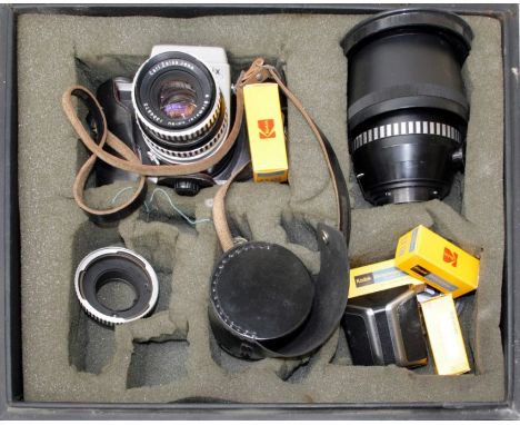 &nbsp;A Pentacon six 35mm SLR camera with Carl Zeiss lens together with some accessories within a professional carrying case&