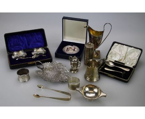 A mixed lot of small silver items, to include a quaiche, Edinburgh 1921, helmet shape cream, Christening mug, two serviette r