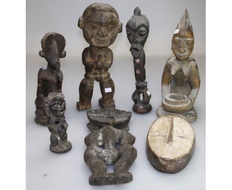 An Indonesian Dayak style figure, a white painted African mask and various African carved wooden figures&nbsp;