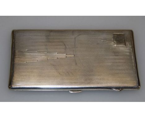 An Art Deco silver engraved and engine turned cigarette case with vacant cartouche, Birmingham 1933, makers mark J C Ltd, app