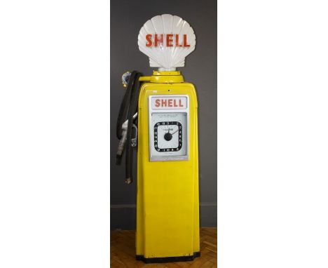 A vintage Avery- Hardoll shell petrol pump, with moulded glass globe, rubber hose and gun nozzle. 190cm