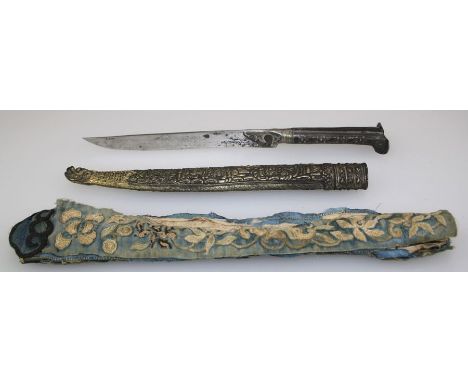 An early 20th century Chinese dagger with bi-coloured metal handle and steel blade in a gilt metal scabbard and cloth slip co