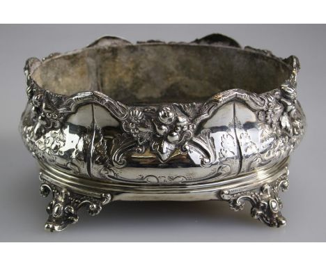 Martin, Hall and Co, Ltd, a Victorian silver table jardinière of oval form, richly cast with fruits and flowers around engrav