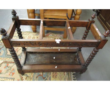 Early 20th century carved oak hall/stick stand on bobbin turned supports.(B.P. 21% + VAT) 