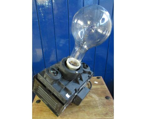Unusual hanging lamp or light fitting, with over sized bulb and rocking mechanism.(B.P. 21% + VAT) 