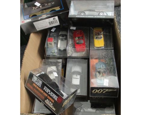 Box comprising Corgi and other 007 James Bond vehicles in original boxes, to include: gold painted range rover, goldeneye Fer