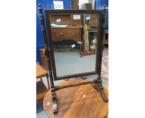 19th century mahogany swivel bedroom mirror with reeded frame, bearing label 'James Reeve Ltd. Birmingham'.(B.P. 21% + VAT) 