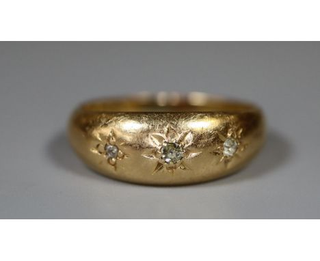 18ct gold three stone diamond ring.  Ring size M.  Approx weight 3.9g.(B.P. 21% + VAT) 