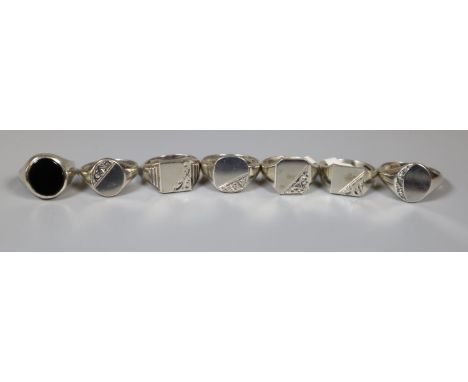 Seven silver signet rings. (B.P. 21% + VAT) Men's Signet rings,   sizes ranging from R, Q,T, R+1/2, O, O+1/2