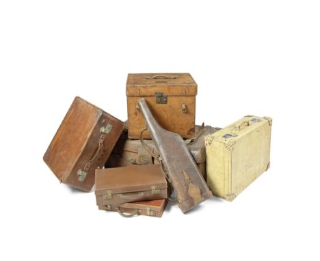 A COLLECTION OF LATE 19TH AND EARLY 20TH CENTURY LEATHER CASESComprising: a leather trunk, stamped Best &amp; Co south Oddly 