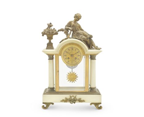 AN ORMOLU AND MARBLE MANTEL CLOCKLate 19th / early 20th century, the dial inscribed Rennison ParisThe 3 1/2-inch dial with Ro