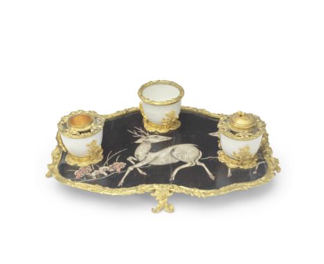 A CHINESE LACQUER AND ORMOLU MOUNTED INKSTAND19th centuryThe shaped panel decorated with a depiction of two deer in a landsca