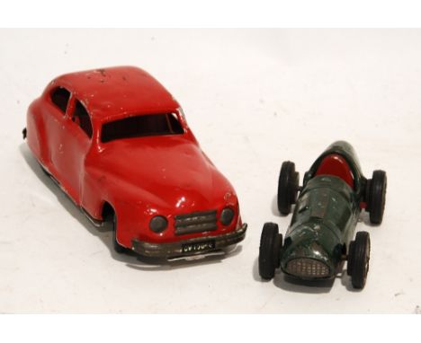 CHAD VALLEY CIRCA 1950s ALUMINIUM RED PAINTED CLOCKWORK SALOON CAR with number okate CV 10046, the base stamped Chad Valley -