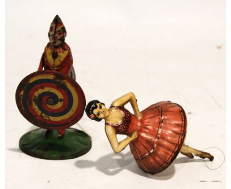 CIRCA 1930s LITHOGRAPH TIN PLATE DANCING BALLERINA with gyroscopic balancing and spinning action, 6" (15.2cm) high and an EAR