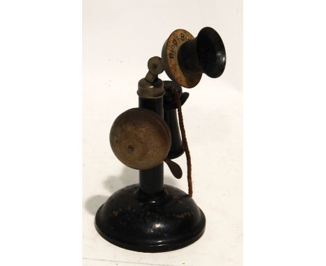 BING, GERMANY, CIRCA 1920s BLACK JAPANNED, PLATED AND LITHOGRAPH TIN PLATE 'BING BING' CANDLESTICK OR DAFFODIL TELEPHONE with