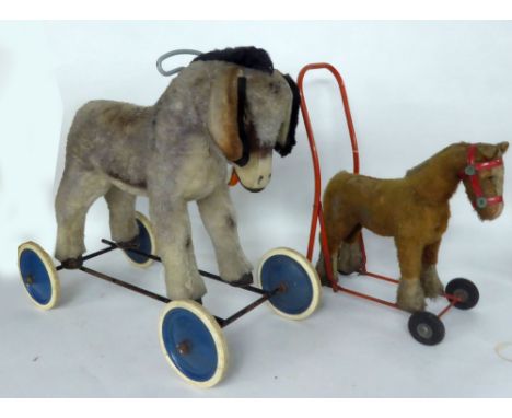 CIRCA 1950s/60s STEIFF CHILD'S PULL-ALONG RIDE-UPON PLUSH COVERED DONKEY with lop ears and glass eyes, on metal frame and blu