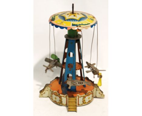 CIRCA 1930s LITHOGRAPH TIN PLATE MERRY-GO-ROUND, the three early passenger planes suspended from the spinning umbrella patter