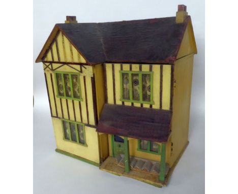 EARLY 20th CENTURY PAINTED WOODEN DOLL'S HOUSE with black and white timbered front, printed paper simulated red tile roof, 19