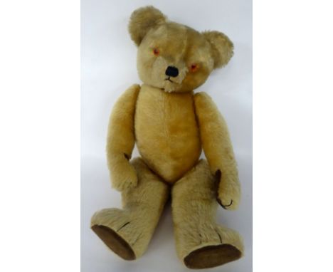 A CIRCA 1950'S CHAD VALLEY GOLDEN PLUSH TEDDY BEAR with velour pads and glass eyes, with growler 28" (71 cm) long