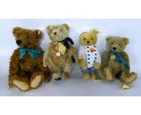 A MODERN STEIFF DARK GOLDEN PLUSH SITTING TEDDY BEAR with cream felt pads protruding muzzle and glass eyes, 14" (35.5 cm), al