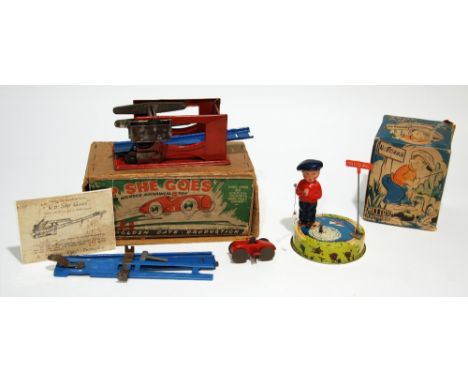 BOXED GOLD GATE PRODUCTION 'UP SHE GOES' TIN PLATE CLOCKWORK OPERATED MECHANICAL TOY and a boxed METTOY CLOCKWORK OPERATED TI