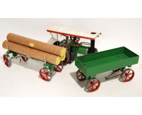 MAMOD STEAM POWERED TRACTOR, in little used condition in green, black and red livery, TOGETHER WITH MINT AND BOXED LUMBER WAG