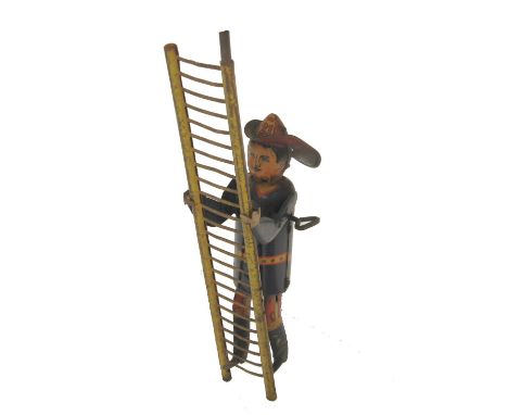 MARX GREAT BRITAIN CIRCA 1930s LITHOGRAPH TIN PLATE CLOCKWORK CLIMBING FIREMAN ascending a tin plate ladder of one section on