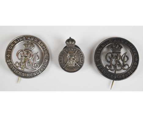 Two British WW1 silver War Badges numbered B200656 and 447127, together with a Royal Army Reserve hallmarked silver lapel bad