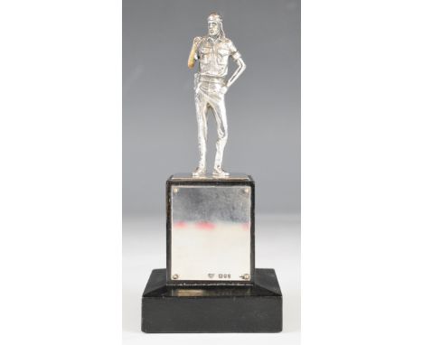 Garrard &amp; Co Ltd hallmarked silver model of a Firquat Omani soldier, on black ebonised base, London 1977, overall height 