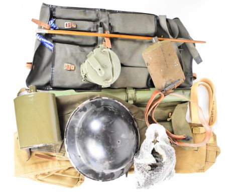 A collection of militaria including machine gun cleaning kit in canvas bag, spare barrel case, link ammunition drum, link for