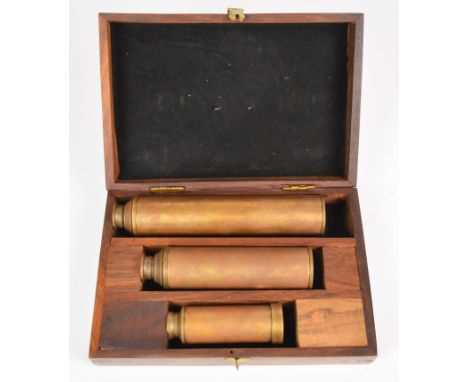 Graduated set of three brass telescopes, in wooden box, maximum length of longest telescope 45cm