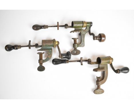 Three shotgun cartridge re-loading roll turnover tools, two for 12 bore including one James Dixon &amp; Sons 2040 and one for