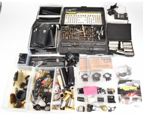 A collection of shotgun and rifle accessories including Boss, Purdey and similar snapcaps, Simmons and Tasco bore sighters, s