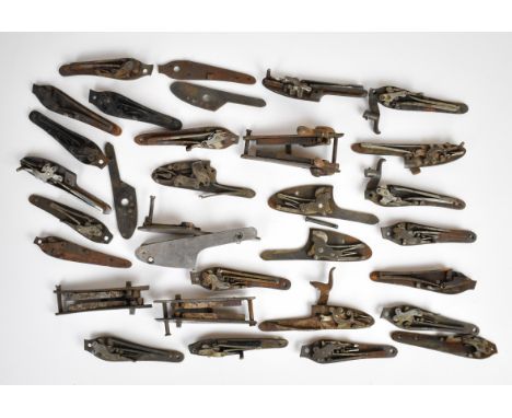 Thirty five vintage percussion shotgun locks and lock plates including some pairs and some named including Westley Richards, 