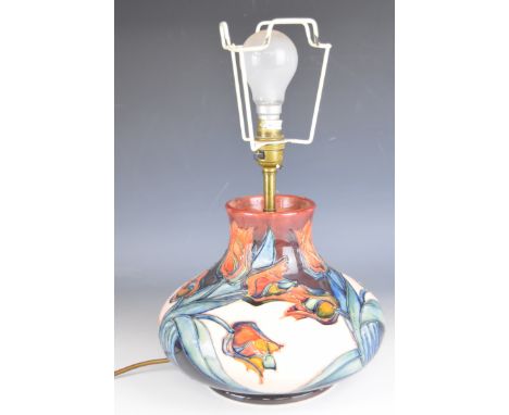 Moorcroft pedestal ship's decanter shaped table lamp decorated in the Tulip pattern, signed to base, H38cm