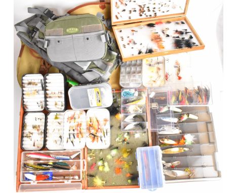 Collection of fly / predator fishing equipment including House of Hardy and Orvis bags, multiple fly, lure, spoon and plug fi