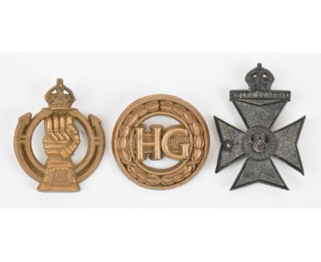 Three British WW2 Economy badges comprising Home Guard and Royal Armoured Corps both by A. Stanley &amp; Sons, Walsall and a 