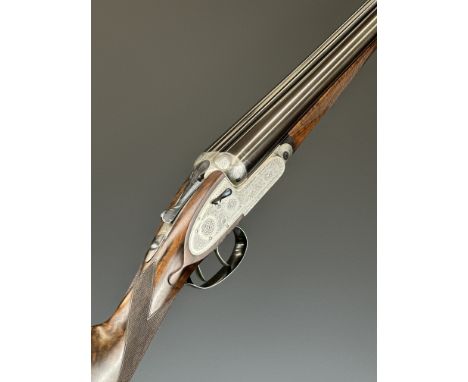 James Purdey &amp; Sons 12 bore assisted-opening side by side sidelock ejector shotgun with hand detachable locks, fine rose 