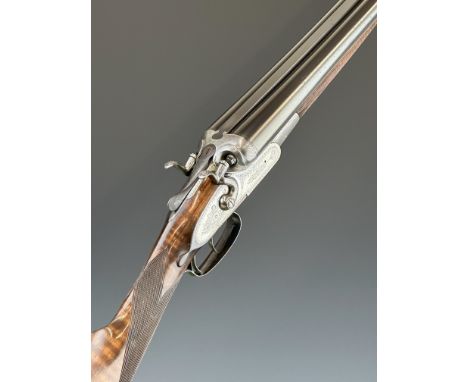 John Rigby &amp; Co of Dublin 12 bore side by side hammer action shotgun with named and engraved lock, engraved hammers, trig