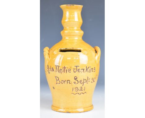 Edwin Jenkins for Ewenny Pottery twin handled money box with inscription 'Ida Nettie Jenkins, Born Septr 30th 1921' Ida being